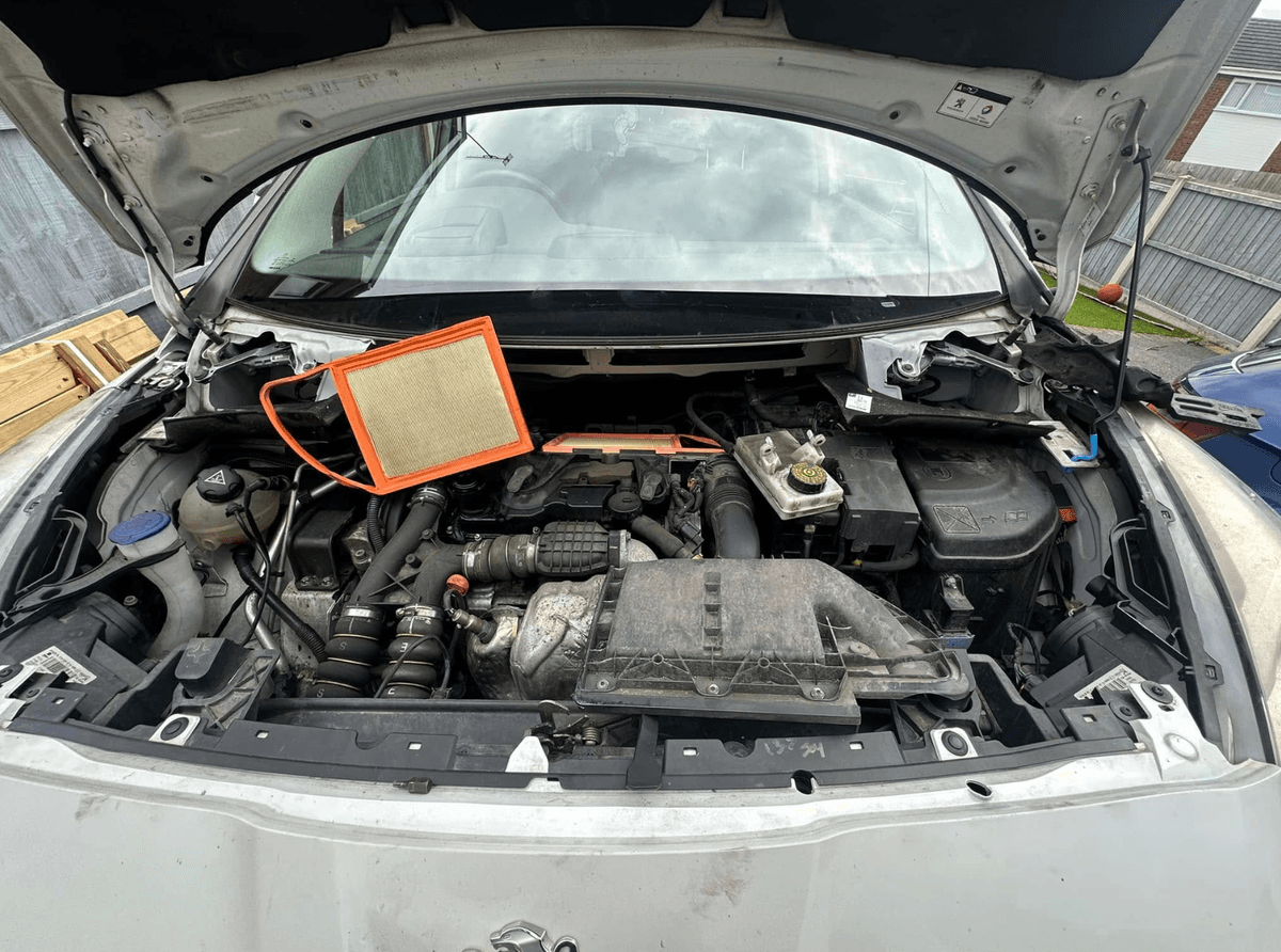 Mechanic working on a car