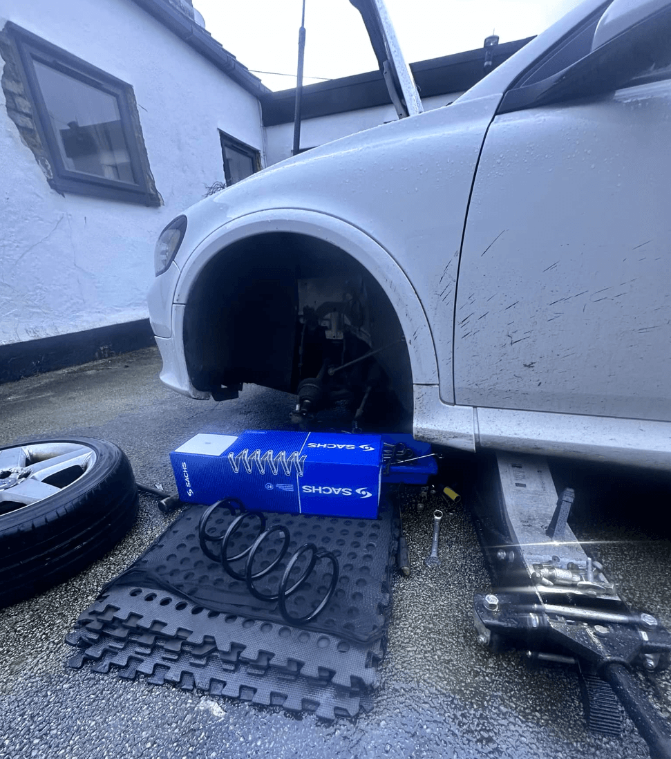Mechanic working on a car